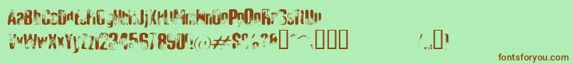 ElliotsBadDay4-Schriftart – Braune Schriften auf grünem Hintergrund