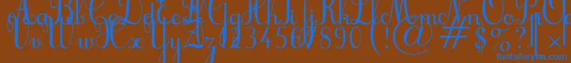 Cursif Font – Blue Fonts on Brown Background