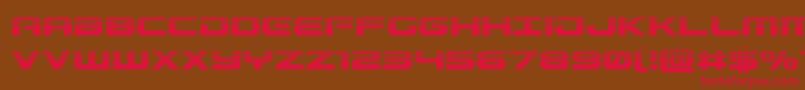 フォントGunshiphalf – 赤い文字が茶色の背景にあります。