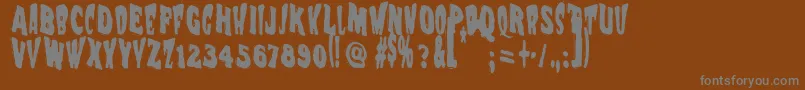 Vtc Nightofthewackeddead Font – Gray Fonts on Brown Background