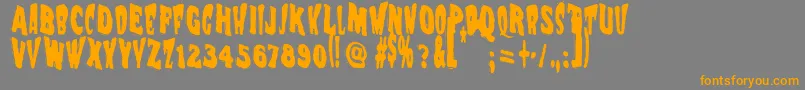フォントVtc Nightofthewackeddead – オレンジの文字は灰色の背景にあります。