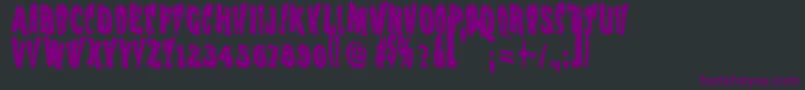 Шрифт Vtc Nightofthewackeddead – фиолетовые шрифты на чёрном фоне