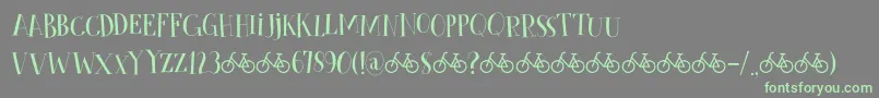 Шрифт CykelsmedDemo – зелёные шрифты на сером фоне