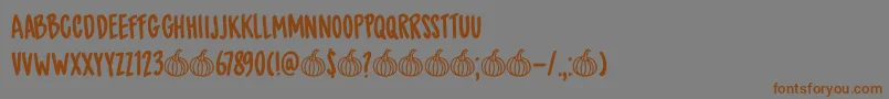 Шрифт DkSpicedPumpkin – коричневые шрифты на сером фоне