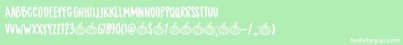 Шрифт DkSpicedPumpkin – белые шрифты на зелёном фоне