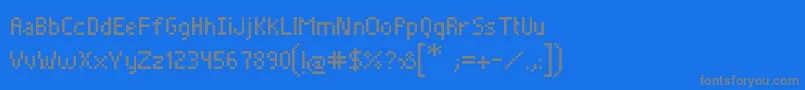 Czcionka Pixelade – szare czcionki na niebieskim tle