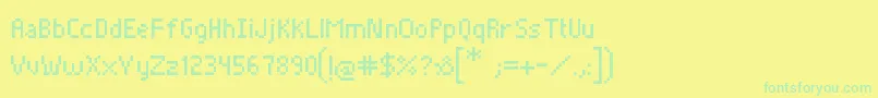 フォントPixelade – 黄色い背景に緑の文字