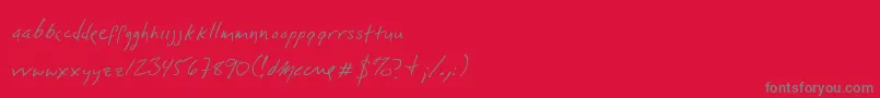 Dlylehand-Schriftart – Graue Schriften auf rotem Hintergrund