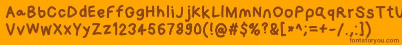 Loogiehawk-Schriftart – Braune Schriften auf orangefarbenem Hintergrund