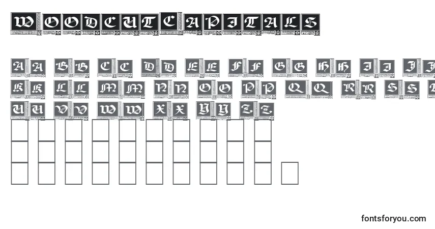 A fonte WoodcutCapitals – alfabeto, números, caracteres especiais