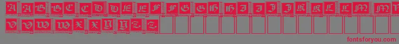 WoodcutCapitals Font – Red Fonts on Gray Background