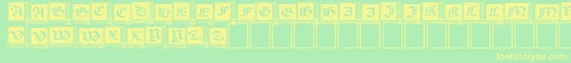 Шрифт WoodcutCapitals – жёлтые шрифты на зелёном фоне