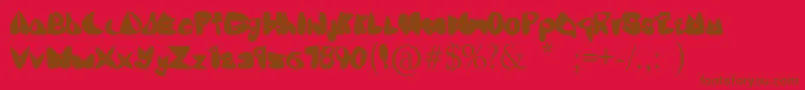 Oneleash Font – Brown Fonts on Red Background