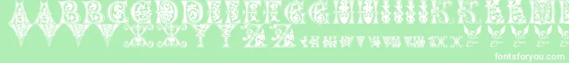 フォントFloralMajuscules11thC – 緑の背景に白い文字