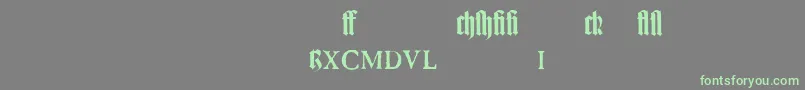 フォントTexturgotischLtExpertDfr – 灰色の背景に緑のフォント