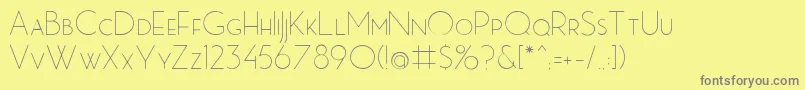 MbPictureHouseTwoLight-fontti – harmaat kirjasimet keltaisella taustalla