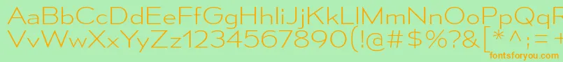 フォントMesmerizeSeEl – オレンジの文字が緑の背景にあります。
