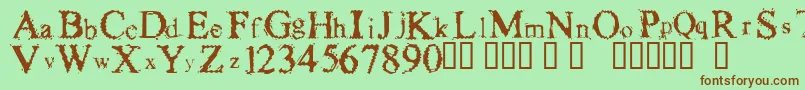 FuzzysockThin Font – Brown Fonts on Green Background