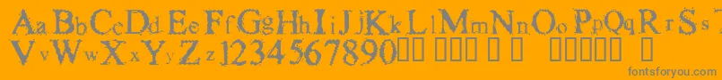 FuzzysockThin-Schriftart – Graue Schriften auf orangefarbenem Hintergrund