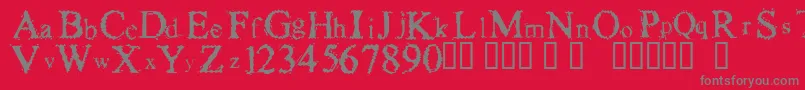 Шрифт FuzzysockThin – серые шрифты на красном фоне
