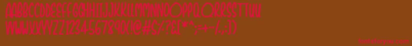 Shockers-Schriftart – Rote Schriften auf braunem Hintergrund