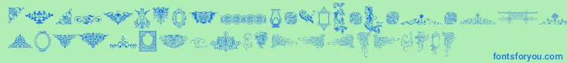 Czcionka VictorianFreeOrnamentsTwo – niebieskie czcionki na zielonym tle