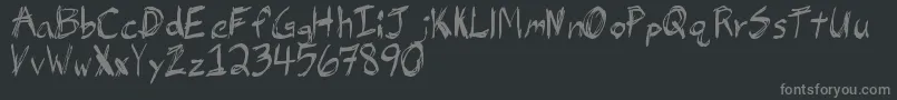 JbHell-fontti – harmaat kirjasimet mustalla taustalla