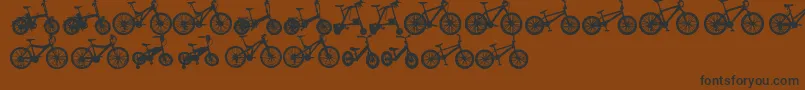 BicycleTfb-Schriftart – Schwarze Schriften auf braunem Hintergrund