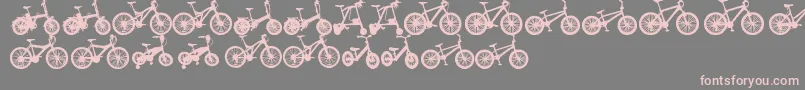 フォントBicycleTfb – 灰色の背景にピンクのフォント