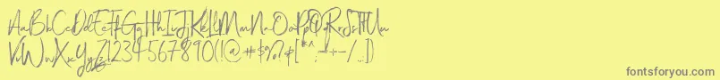Magnite-Schriftart – Graue Schriften auf gelbem Hintergrund