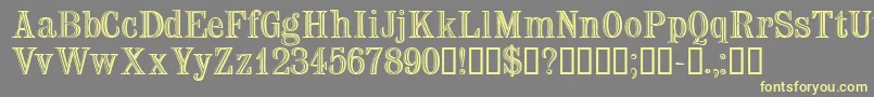 Trixssk Font – Yellow Fonts on Gray Background