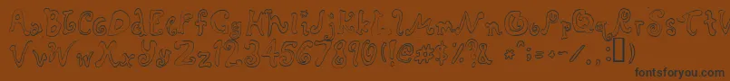 Rascal Font – Black Fonts on Brown Background