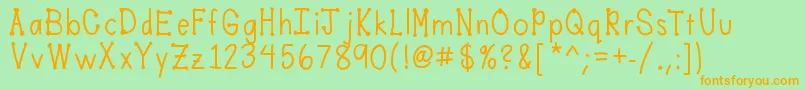 フォントMobilesfont – オレンジの文字が緑の背景にあります。