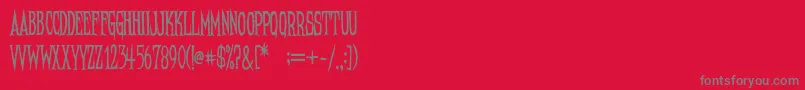 Police NeedleteethRegular – polices grises sur fond rouge