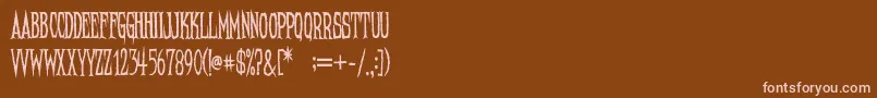 NeedleteethRegular Font – Pink Fonts on Brown Background