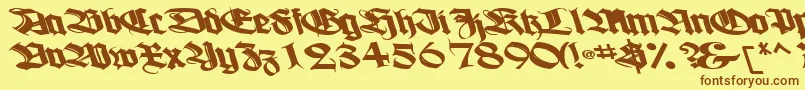 Boogiewoogiebold112Bold-Schriftart – Braune Schriften auf gelbem Hintergrund