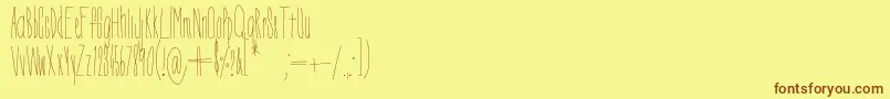 Czcionka DorothyMiranda – brązowe czcionki na żółtym tle