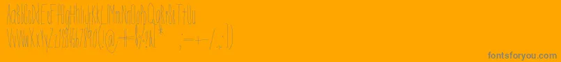 DorothyMiranda-fontti – harmaat kirjasimet oranssilla taustalla