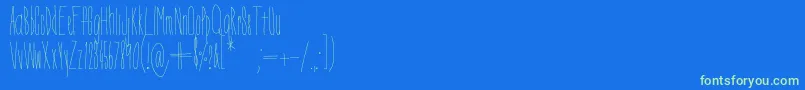 フォントDorothyMiranda – 青い背景に緑のフォント
