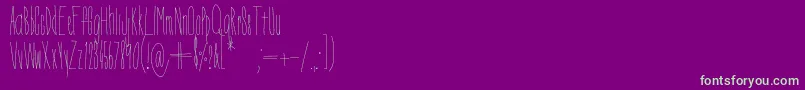 フォントDorothyMiranda – 紫の背景に緑のフォント