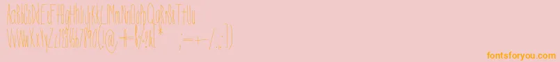 Czcionka DorothyMiranda – pomarańczowe czcionki na różowym tle