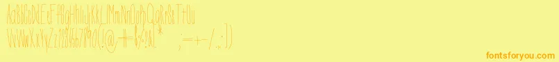 Czcionka DorothyMiranda – pomarańczowe czcionki na żółtym tle