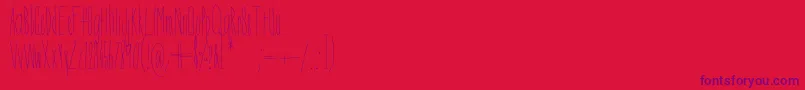 Czcionka DorothyMiranda – fioletowe czcionki na czerwonym tle