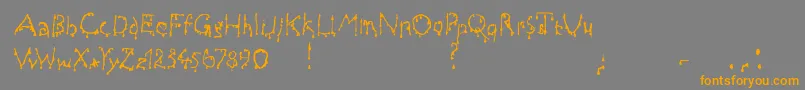 フォントDraculas – オレンジの文字は灰色の背景にあります。