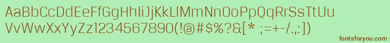 BreuertextLight-fontti – ruskeat fontit vihreällä taustalla