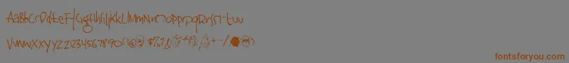 Jinkya-Schriftart – Braune Schriften auf grauem Hintergrund
