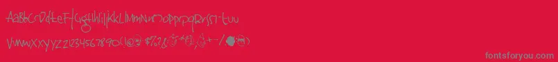 Jinkya-Schriftart – Graue Schriften auf rotem Hintergrund