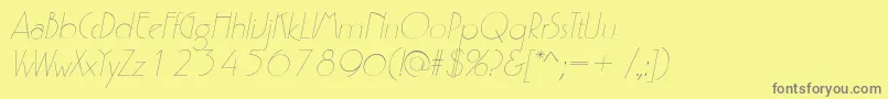 Fonte P700DecoItalic – fontes cinzas em um fundo amarelo