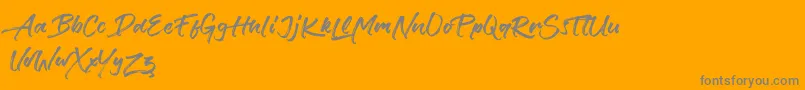 Verbena-Schriftart – Graue Schriften auf orangefarbenem Hintergrund