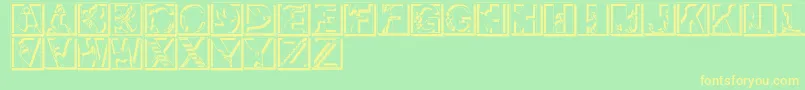 フォントPixcapsshadow – 黄色の文字が緑の背景にあります